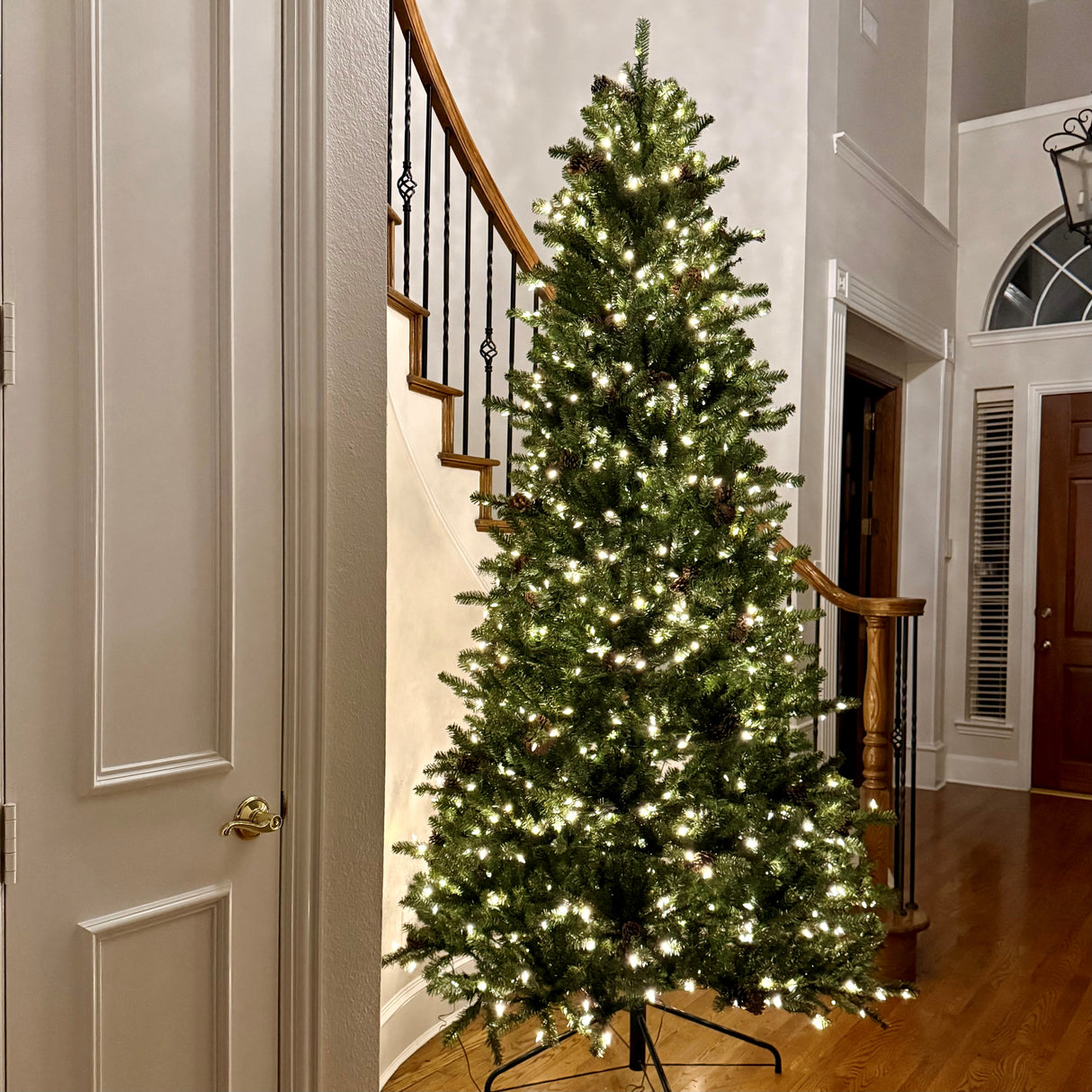 9 Ft. Tall Montana Fir Artificial Christmas Tree with Soft White T5 LED Lights, Instant Shape Memory Wire, and Foot Pedal for Easy Use