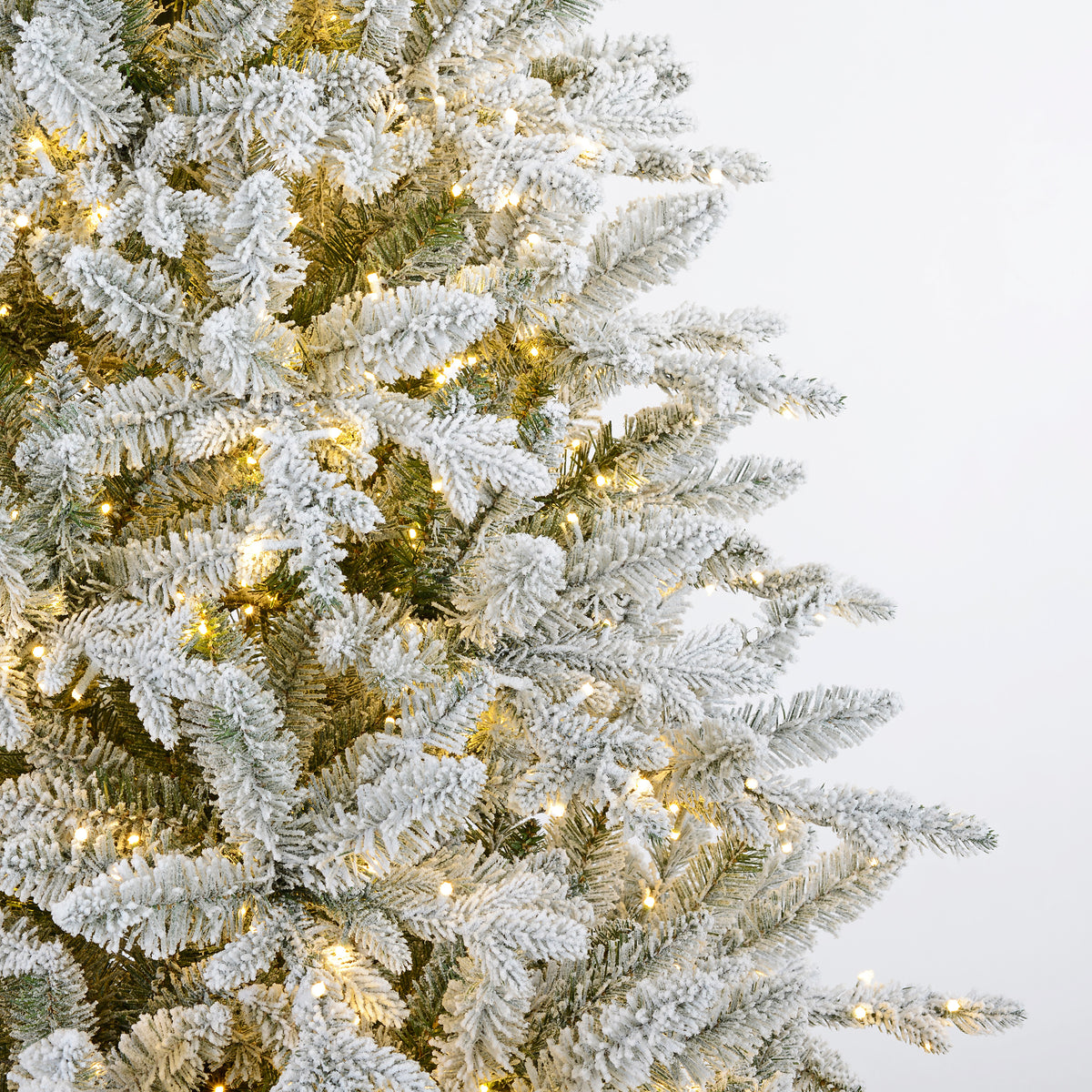 Flocked Queensbury Fir 7.5 Ft. Christmas Tree with 8 Function Lights Including Twinkle