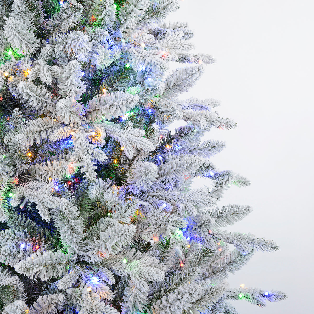 Flocked Queensbury Fir 7.5 Ft. Christmas Tree with 8 Function Lights Including Twinkle