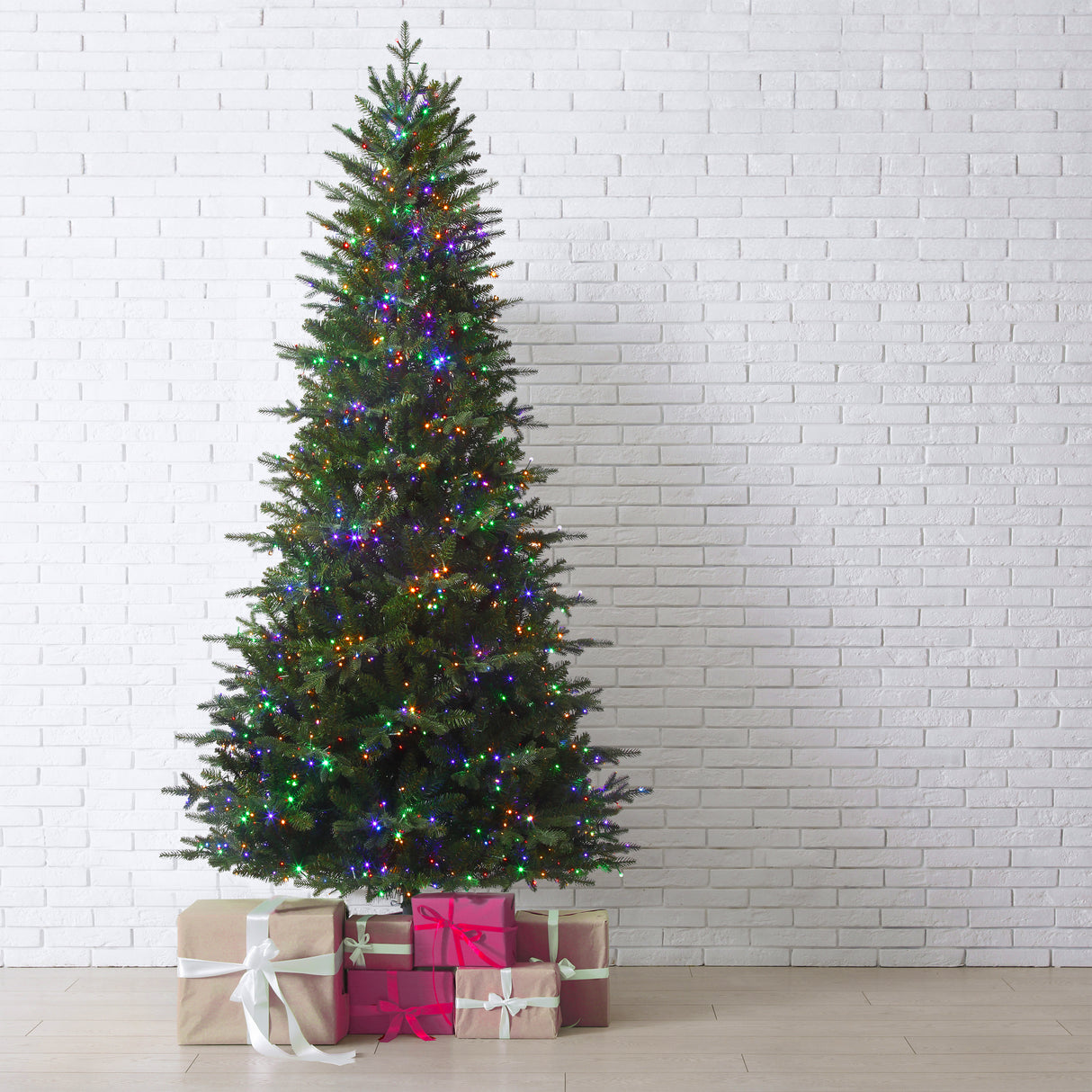 7.5 Ft. Tall Queensbury PE Fir Christmas Tree with 8 Function LED Lights, Instant Shape Memory Wire, and Foot Pedal Control