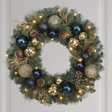 Haute Decor 24 Inch Sutton Place Christmas Wreath with Soft White LED Lights on Automatic Timer - Pre-Lit Christmas Wreath Featuring Blue and Gold Shatterproof Ornaments