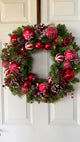 Haute Decor 26 Inch Holiday Times Wreath with Patterned Red and White Shatterproof Ornaments, Berries, and Real Pinecones